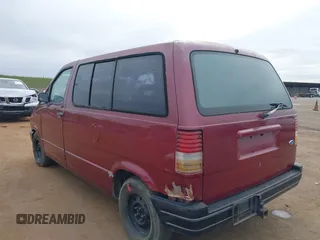 1989 Ford Aerostar with VIN 1FMCA11U2KZC19215, listed as a IAAI auction lot 41719140 with 3,566 mi miles. Bid and sale history available at carsss.com. Image 3.