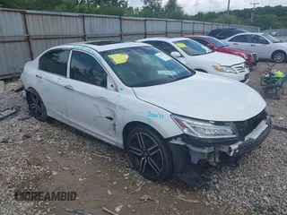 2017 Honda Accord Touring with VIN 1HGCR3F98HA003410, listed as a IAAI auction lot 42534659 with 211,470 mi miles and . Bid and sale history available at DreamBid. Image 1.