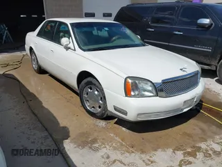 2004 Cadillac DeVille z VIN 1G6KD54Y04U102197, wystawiony jako IAAI lot #41940502 z przebiegiem Nie podano mil oraz . Historia ofert i sprzedaży dostępna na DreamBid. Obrazek 3.