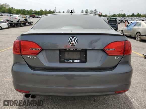 2012 Volkswagen Jetta TDI w/Premium & Nav z VIN 3VWLL7AJ8CM319746, wystawiony jako Copart lot #54313335 z przebiegiem 186 003 mil mil oraz Czysty tytuł • Clean title. Historia ofert i sprzedaży dostępna na DreamBid. Obrazek 6.