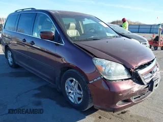 2007 Honda Odyssey EX-L with VIN 5FNRL38697B460066, listed as a IAAI auction lot 41453305 with 169,008 mi miles. Bid and sale history available at carsss.com. Image 1.