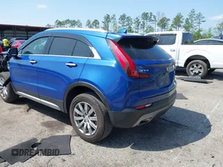 2023 Cadillac XT4 FWD Premium Luxury with VIN 1GYFZCR43PF104796, listed as a IAAI auction lot 41931695 with 12,666 mi miles. Bid and sale history available at carsss.com. Image 3.