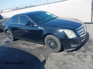 2008 Cadillac CTS RWD z VIN 1G6DF577180143506, wystawiony jako IAAI lot #42422201 z przebiegiem 157 003 mil mil oraz . Historia ofert i sprzedaży dostępna na DreamBid. Obrazek 1.