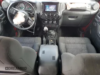 2012 Jeep Wrangler Unlimited Rubicon with VIN 1C4HJWFG2CL219021, listed as a Copart auction lot 87451784 with 109,675 mi miles and Salvage title. Bid and sale history available at DreamBid. Image 8.