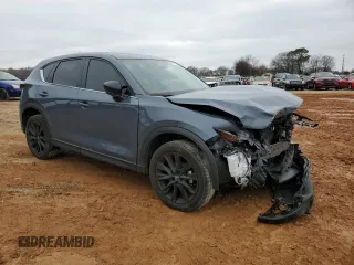 2023 Mazda CX-5 S Carbon Edition with VIN JM3KFBCM9P0280049, listed as a Copart auction lot 85712024 with 13,694 mi miles and Salvage Title. Bid and sale history available at DreamBid. Image 4.