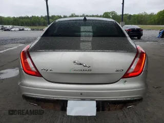 2016 Jaguar XJ Portfolio with VIN SAJWA2G70G8V93006, listed as a Copart auction lot 52324635 with 123,690 mi miles and Salvage Title. Bid and sale history available at DreamBid. Image 6.