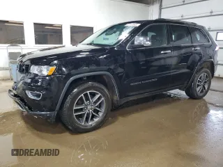 2018 Jeep Grand Cherokee Limited with VIN 1C4RJFBG7JC142671, listed as a Copart auction lot 61340695 with 173,954 mi miles and Salvage title. Bid and sale history available at DreamBid. Image 1.