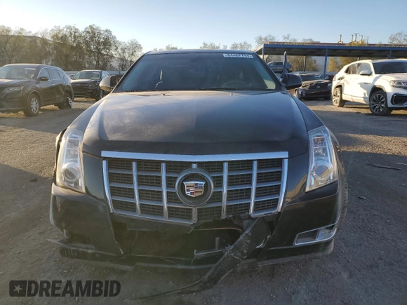 2012 Cadillac CTS Premium с VIN 1G6DP5E39C0103583, выставлен на аукционе Copart как лот 84482794 с пробегом 176 233 миль миль и Списание • Salvage title. История ставок и продаж доступна на DreamBid. Изображение 5.