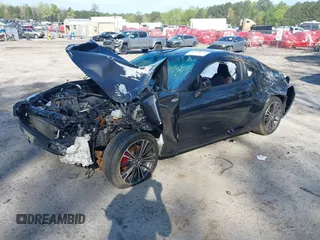 2015 Scion FR-S with VIN JF1ZNAA10F8707671, listed as a IAAI auction lot 42000130 with 136,734 mi miles. Bid and sale history available at carsss.com. Image 2.