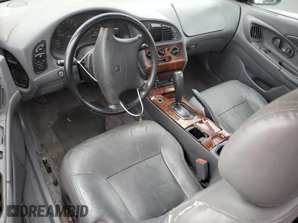 1997 Chrysler Sebring LXi z VIN 4C3AU52N2VE183090, wystawiony jako Copart lot #81855454 z przebiegiem 157 590 mil mil oraz Szkoda całkowita • Salvage title. Historia ofert i sprzedaży dostępna na DreamBid. Obrazek 8.