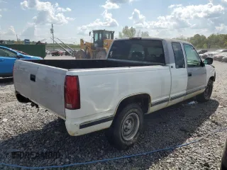 1994 GMC Sierra 1500 with VIN 1GTEC19KXRE557960, listed as a Copart auction lot 71677974 with 194,641 mi miles and Salvage Title. Bid and sale history available at DreamBid. Image 3.
