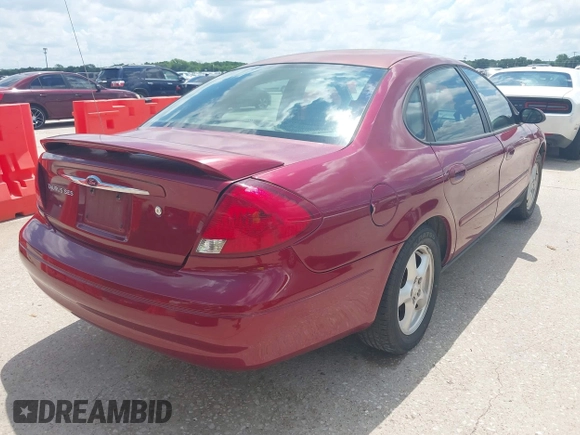 2003 Ford Taurus SES Standard with VIN 1FAFP55U93G244522, listed as a IAAI auction lot 42234122 with 140,850 mi miles and . Bid and sale history available at DreamBid. Image 4.