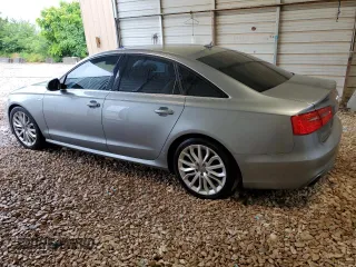 2013 Audi A6 Prestige with VIN WAUJGAFC9DN060792, listed as a Copart auction lot 58141305 with 129,735 mi miles and Salvage title. Bid and sale history available at DreamBid. Image 2.