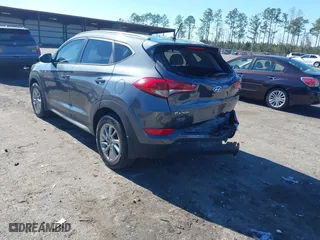 2017 Hyundai Tucson SE Plus with VIN KM8J33A45HU420349, listed as a IAAI auction lot 41296190 with 77,910 mi miles. Bid and sale history available at carsss.com. Image 3.
