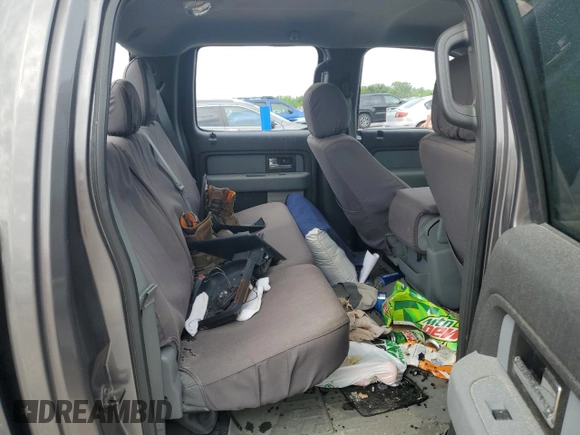 2012 Ford F-150 XL with VIN 1FTFW1EF3CFC92031, listed as a Copart auction lot 57265765 with 173,000 mi miles and Salvage title. Bid and sale history available at DreamBid. Image 10.
