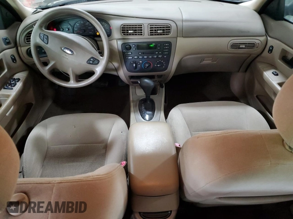 2003 Ford Taurus SE Standard with VIN 1FAFP53U83G228072, listed as a Copart auction lot 57486335 with 93,451 mi miles and Salvage title. Bid and sale history available at DreamBid. Image 8.