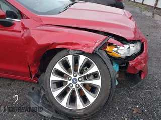 2020 Ford Fusion SE z VIN 3FA6P0T97LR234873, wystawiony jako IAAI lot #41510333 z przebiegiem 65 243 mil mil oraz . Historia ofert i sprzedaży dostępna na DreamBid. Obrazek 17.