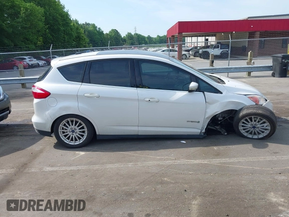 2015 Ford C-Max SEL z VIN 1FADP5BU1FL111048, wystawiony jako IAAI lot #42171942 z przebiegiem 132 637 mil mil oraz . Historia ofert i sprzedaży dostępna na DreamBid. Obrazek 13.