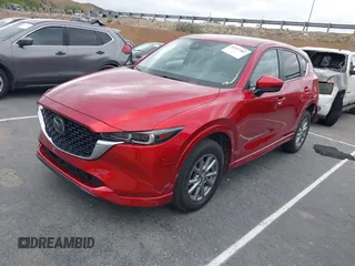 2024 Mazda CX-5 S Carbon Edition z VIN JM3KFBCL3R0431347, wystawiony jako IAAI lot #42057582 z przebiegiem 34 870 mil mil oraz . Historia ofert i sprzedaży dostępna na DreamBid. Obrazek 18.