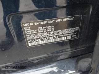 2019 BMW 5 Series 530e with VIN WBAJA9C56KB388241, listed as a IAAI auction lot 42181217 with 69,805 mi miles and . Bid and sale history available at carsss.com. Image 9.