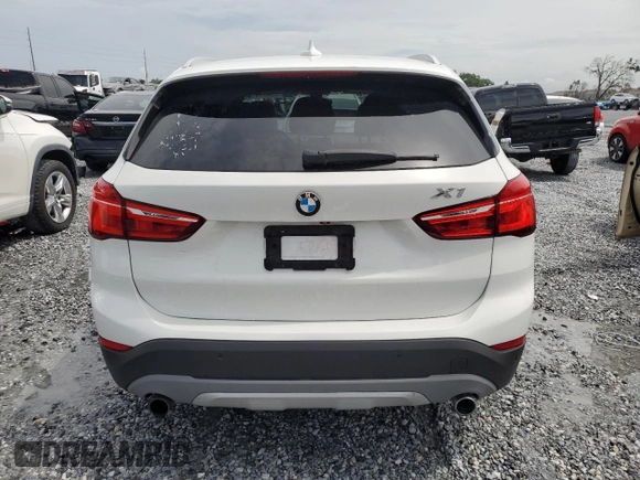 2017 BMW X1 xDrive28i with VIN WBXHT3Z37H4A55614, listed as a Copart auction lot 63491415 with 120,680 mi miles and Salvage title. Bid and sale history available at DreamBid. Image 6.