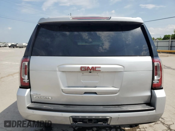 2017 GMC Yukon SLT z VIN 1GKS1BKC4HR375877, wystawiony jako Copart lot #55150545 z przebiegiem 144 788 mil mil oraz Szkoda całkowita • Salvage title. Historia ofert i sprzedaży dostępna na DreamBid. Obrazek 6.