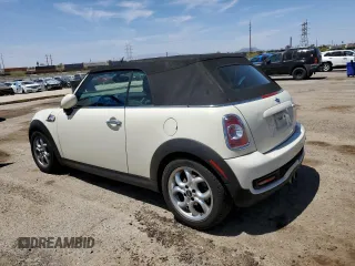 2011 MINI Convertible S with VIN WMWZP3C51BTX83131, listed as a Copart auction lot 57136355 with 118,364 mi miles and Clean Title. Bid and sale history available at DreamBid. Image 2.