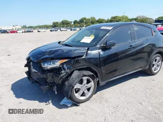 2021 Honda HR-V LX with VIN 3CZRU5H34MM726934, listed as a IAAI auction lot 41797859 with 139,927 mi miles. Bid and sale history available at carsss.com. Image 2.