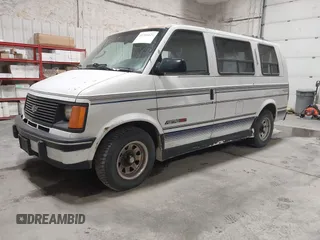 1994 Chevrolet Astro Cargo z VIN 1GBDM19Z0RB167297, wystawiony jako IAAI lot #42305621 z przebiegiem 154 683 mil mil oraz . Historia ofert i sprzedaży dostępna na DreamBid. Obrazek 2.