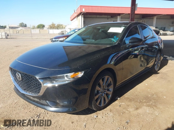 2024 Mazda 3 S Preferred with VIN 3MZBPACM3RM412767, listed as a IAAI auction lot 41518459 with 8,702 mi miles and . Bid and sale history available at carsss.com. Image 2.