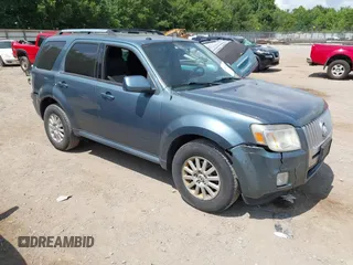2011 Mercury Mariner Premier with VIN 4M2CN9HG8BKJ00403, listed as a IAAI auction lot 42623296 with 197,304 mi miles and . Bid and sale history available at DreamBid. Image 1.