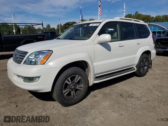 2004 Lexus GX 470 with VIN JTJBT20XX40033938, listed as a Copart auction lot 70871164 with 214,565 mi miles and Salvage Title. Bid and sale history available at carsss.com. Image 1.