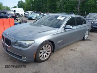 2010 BMW 7 Series 750Li xDrive with VIN WBAKC8C51ACY68317, listed as a IAAI auction lot 42210033 with 124,765 mi miles and . Bid and sale history available at DreamBid. Image 2.