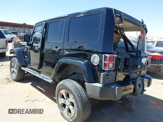 2016 Jeep Wrangler Unlimited 75th Anniversary with VIN 1C4BJWEGXGL270750, listed as a IAAI auction lot 42098170 with 87,316 mi miles and . Bid and sale history available at DreamBid. Image 3.