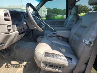 1999 GMC Suburban z VIN 3GKFK16R2XG544767, wystawiony jako Copart lot #67078414 z przebiegiem 154 145 mil mil oraz Szkoda całkowita • Salvage title. Historia ofert i sprzedaży dostępna na DreamBid. Obrazek 7.