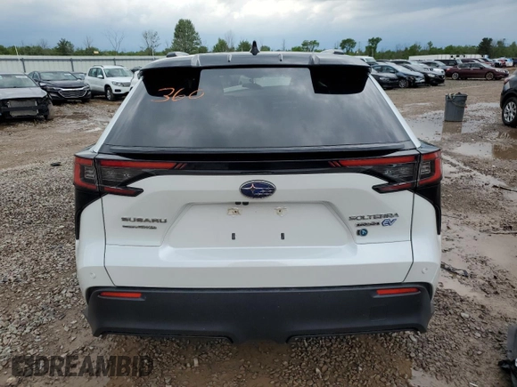 2023 Subaru Solterra Touring with VIN JTMABABA4PA003434, listed as a Copart auction lot 59837165 with 9,587 mi miles and Salvage title. Bid and sale history available at DreamBid. Image 6.
