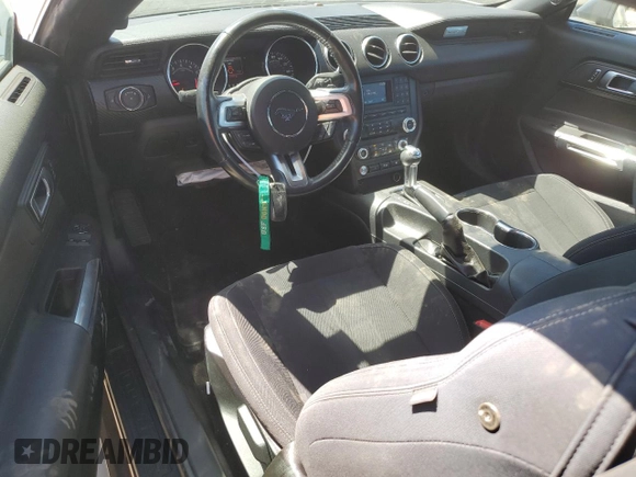 2018 Ford Mustang EcoBoost z VIN 1FA6P8TH3J5129320, wystawiony jako Copart lot #57812415 z przebiegiem 52 841 mil mil oraz Szkoda całkowita • Salvage title. Historia ofert i sprzedaży dostępna na DreamBid. Obrazek 8.
