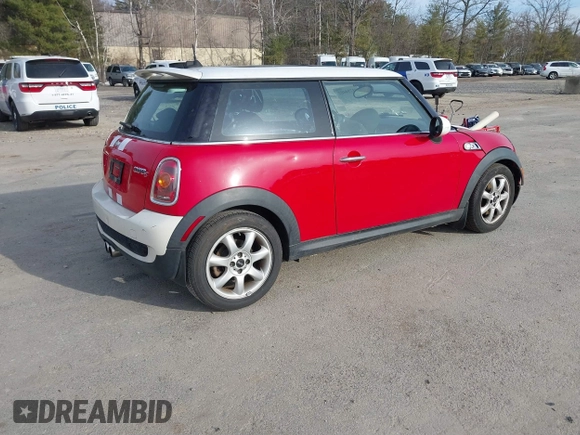 2010 MINI Hardtop S with VIN WMWMF7C54ATZ71743, listed as a IAAI auction lot 41794482 with 136,233 mi miles and . Bid and sale history available at DreamBid. Image 4.