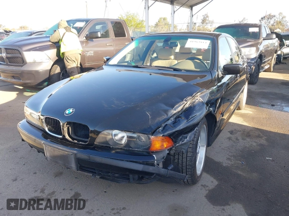 2000 BMW 5 Series 528iA with VIN WBADM6343YGU12629, listed as a IAAI auction lot 41963814 with 206,922 mi miles. Bid and sale history available at carsss.com. Image 17.