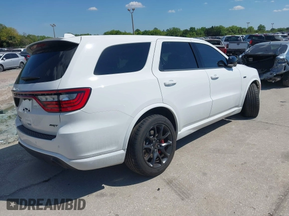 2021 Dodge Durango SRT 392 with VIN 1C4SDJGJ8MC724105, listed as a IAAI auction lot 41883925 with 31,184 mi miles and . Bid and sale history available at DreamBid. Image 4.