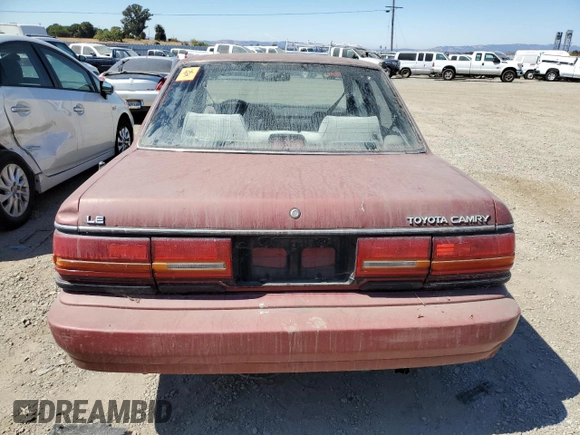 1990 Toyota Camry LE ECT z VIN JT2SV22E0L0351440, wystawiony jako Copart lot #70768614 z przebiegiem 176 239 mil mil oraz Szkoda całkowita • Salvage title. Historia ofert i sprzedaży dostępna na DreamBid. Obrazek 6.