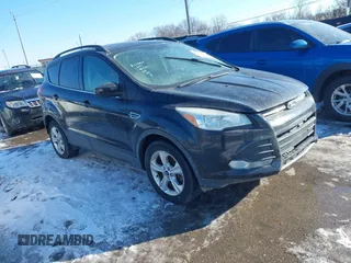 2016 Ford Escape SE with VIN 1FMCU9GX0GUA25455, listed as a IAAI auction lot 41326615 with 137,422 mi miles. Bid and sale history available at carsss.com. Image 1.