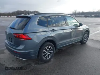 2021 Volkswagen Tiguan S with VIN 3VV1B7AX8MM016874, listed as a IAAI auction lot 41633090 with 76,857 mi miles and . Bid and sale history available at DreamBid. Image 4.