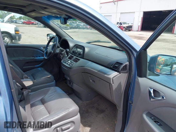 2010 Honda Odyssey EX-L with VIN 5FNRL3H69AB088994, listed as a IAAI auction lot 42007982 with 187,180 mi miles and . Bid and sale history available at DreamBid. Image 5.