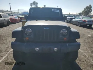 2012 Jeep Wrangler Unlimited Rubicon with VIN 1C4HJWFG9CL276753, listed as a Copart auction lot 62996995 with 234,159 mi miles and Clean title. Bid and sale history available at DreamBid. Image 5.