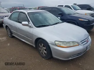 2002 Honda Accord EX z VIN 1HGCG56622A096469, wystawiony jako IAAI lot #42197316 z przebiegiem 228 617 mil mil oraz . Historia ofert i sprzedaży dostępna na DreamBid. Obrazek 1.