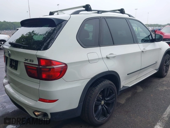 2012 BMW X5 35i с VIN 5UXZV4C5XCL765368, выставлен на аукционе IAAI как лот 42526136 с пробегом 165 365 миль миль и . История ставок и продаж доступна на DreamBid. Изображение 4.
