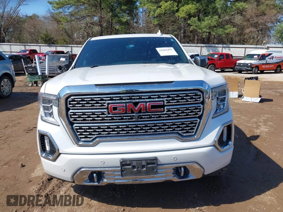 2020 GMC Sierra 1500 Denali z VIN 1GTU9FEL7LZ152659, wystawiony jako IAAI lot #41662492 z przebiegiem 101 222 mil mil oraz . Historia ofert i sprzedaży dostępna na DreamBid. Obrazek 12.