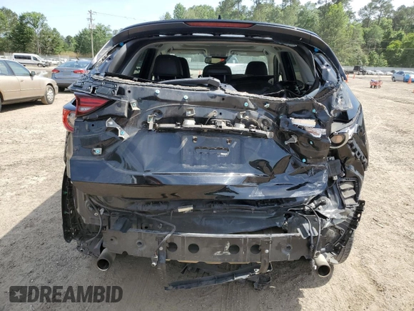 2018 Mazda CX-5 Grand Touring z VIN JM3KFADM2J1381752, wystawiony jako Copart lot #56889835 z przebiegiem 96 820 mil mil oraz Szkoda całkowita • Salvage title. Historia ofert i sprzedaży dostępna na DreamBid. Obrazek 6.