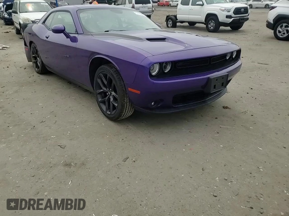 2019 Dodge Challenger SXT z VIN 2C3CDZAGXKH716960, wystawiony jako Copart lot #57473655 z przebiegiem 64 293 mil mil oraz Szkoda całkowita • Salvage title. Historia ofert i sprzedaży dostępna na DreamBid. Obrazek 14.